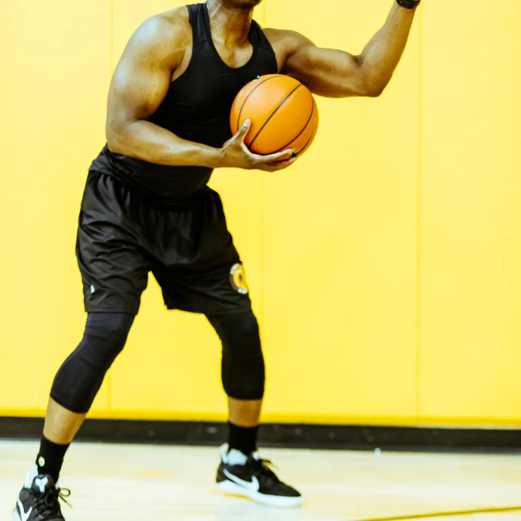 Studio dribble action shot during a UGIS basketball training session