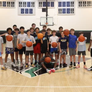 Group of athletes at a UGIS basketball clinic