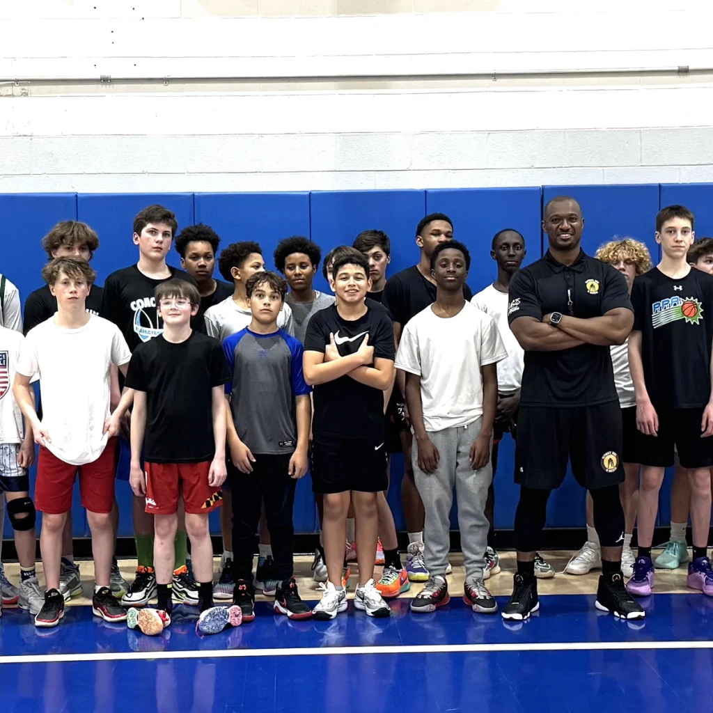Group of athletes at a UGIS basketball clinic