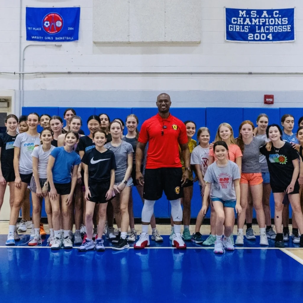 Group of athletes at a UGIS basketball clinic