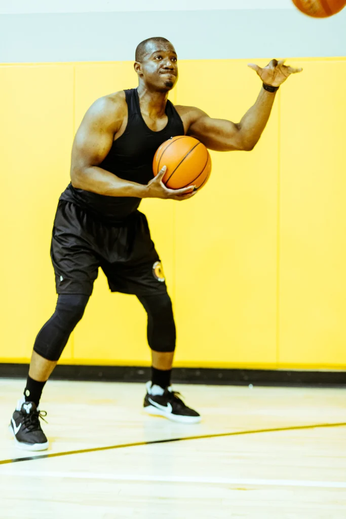 Coach Emmanuel mid-action with the ball