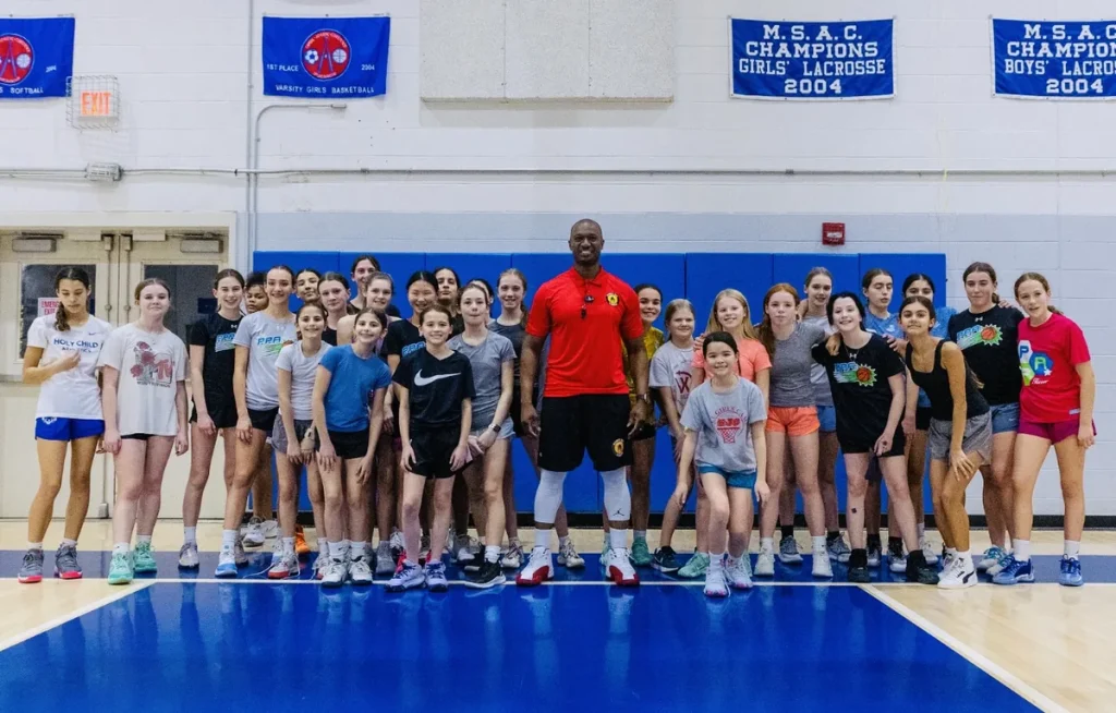 With a girls basketball team